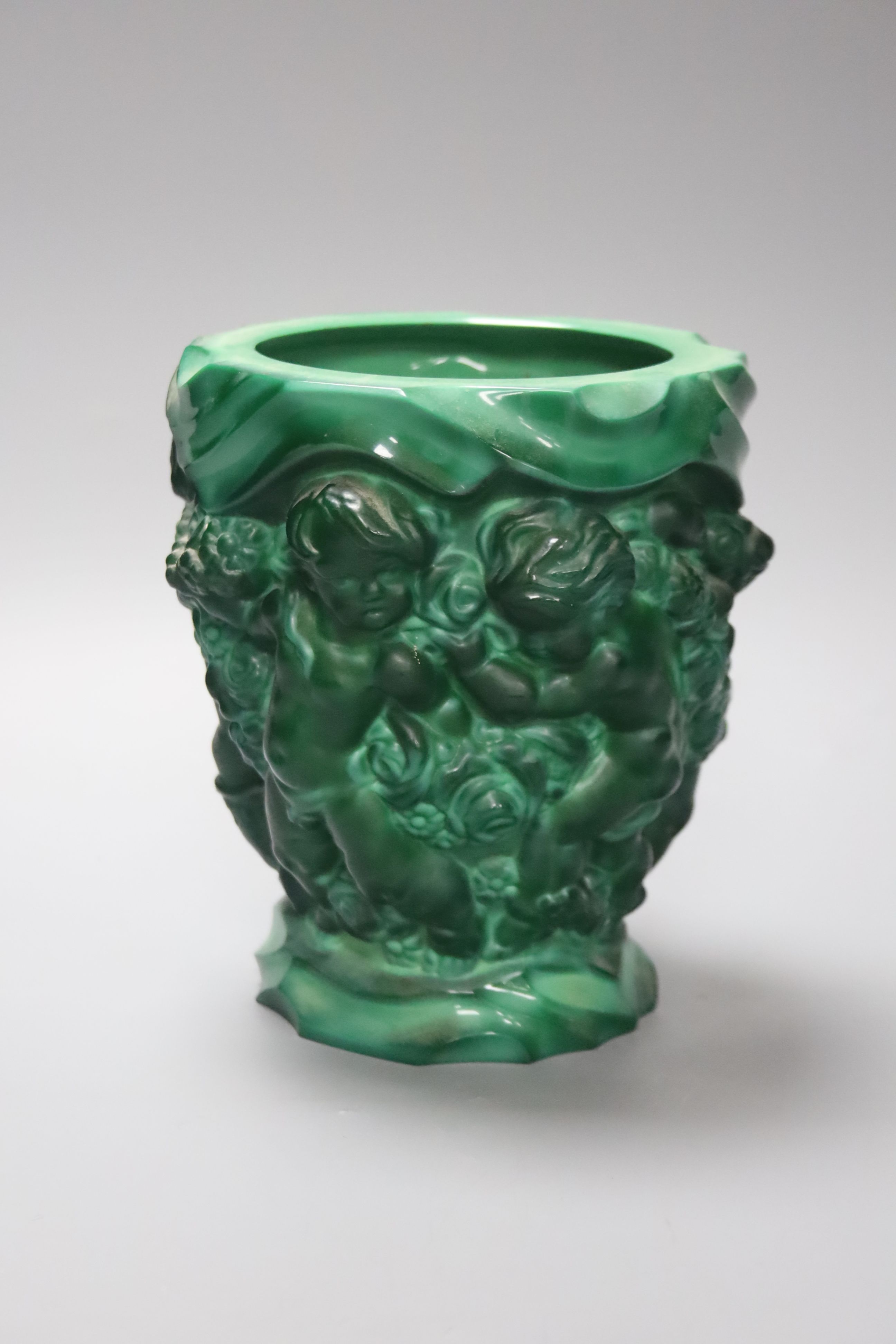 A Czech malachite glass vase with cherubs designed for Schlevogt, c.1920, height 19cm